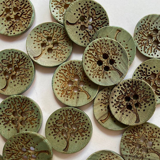 Green wooden button with laser tree