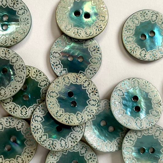 Pearly blue shell button with laser edge