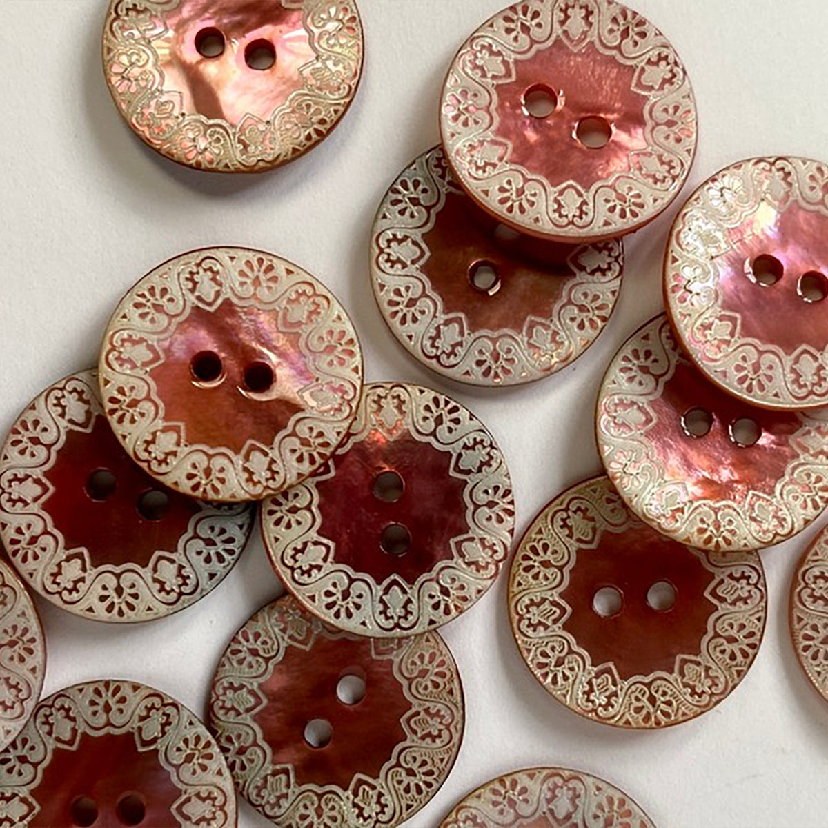 Pearly rose pink shell button with laser edge